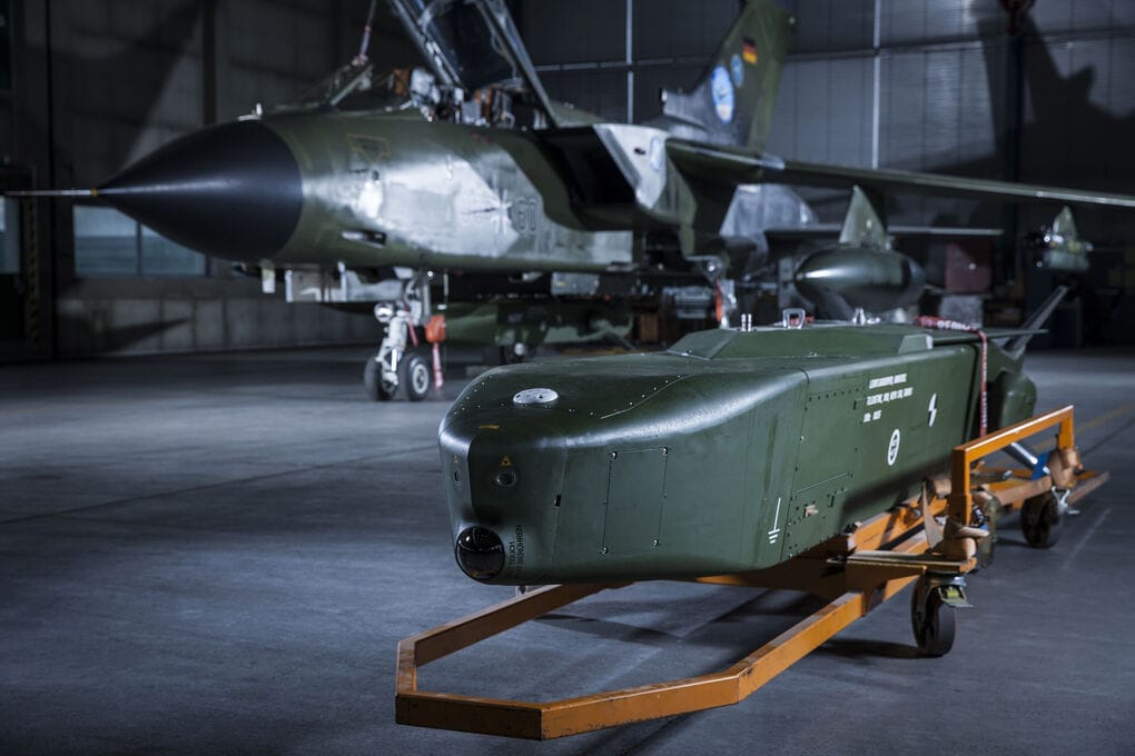 Germany's Taurus KEPD 350 missile in hangar with Tornado aircraft, representing Berlin's withheld long-range strike capability.